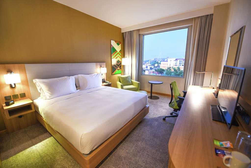 Hilton Garden Inn Кампала Номер фото